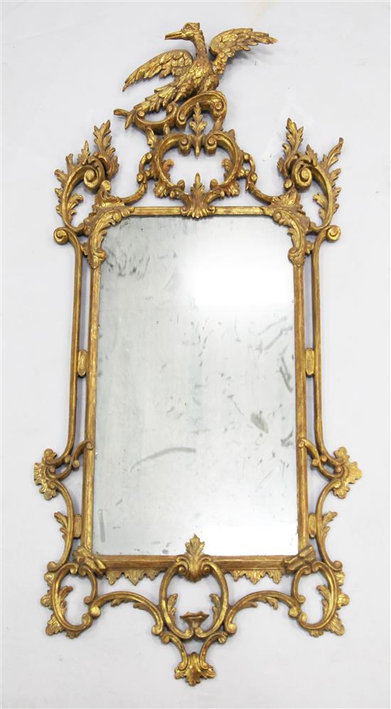 A George III giltwood carved and gesso wall mirror, 4ft 5in x 2ft 3in.